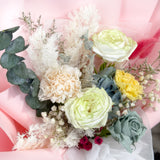 Closeup detail of the preserved roses, carnations, and foliage in the Aromatears Designer's Choice Preserved Mixed Bouquet, showcasing the texture and lasting beauty of flowers that last up to 5 years.